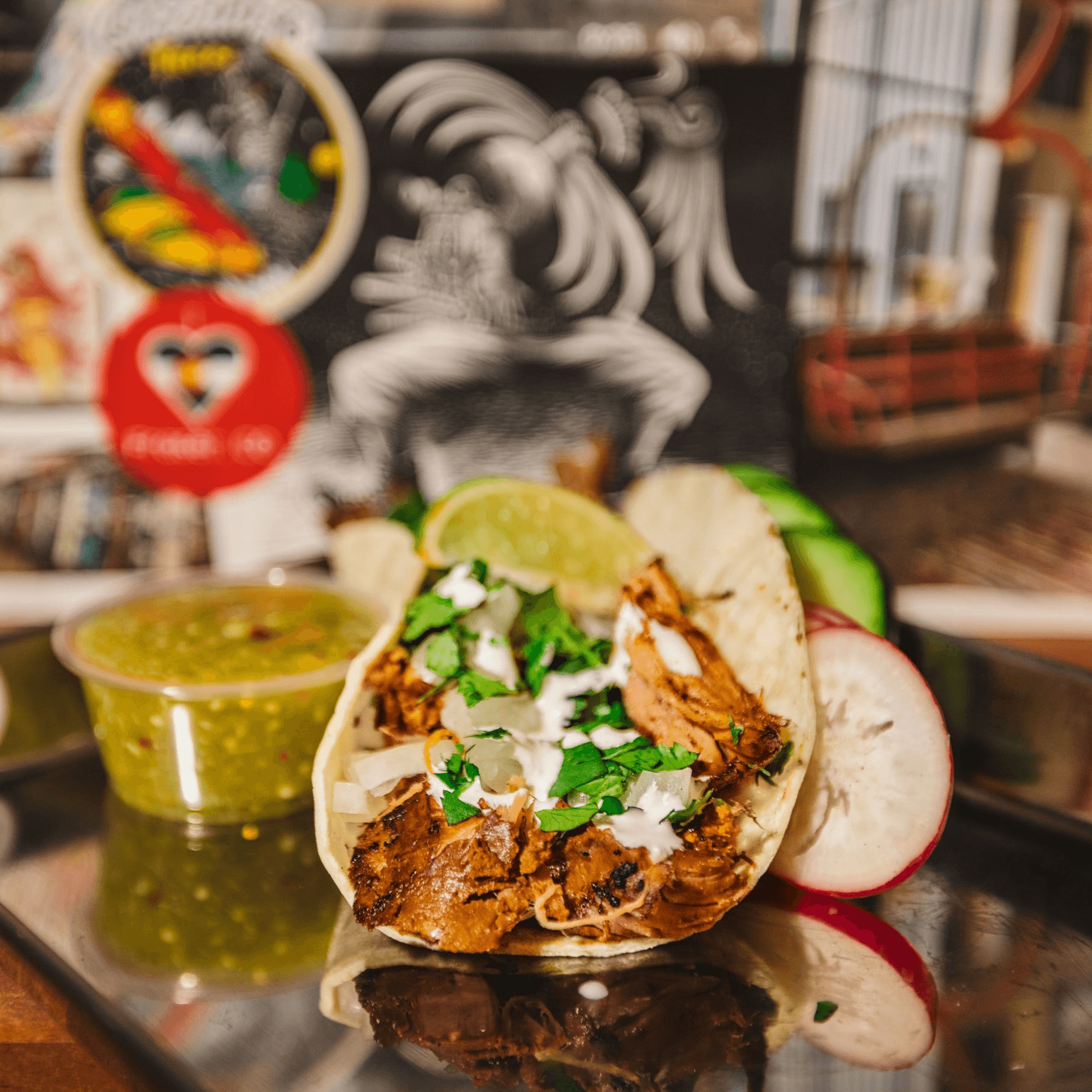 Carnitas Street Taco taco — Michoacán pork, pickled red onion, salsa verde